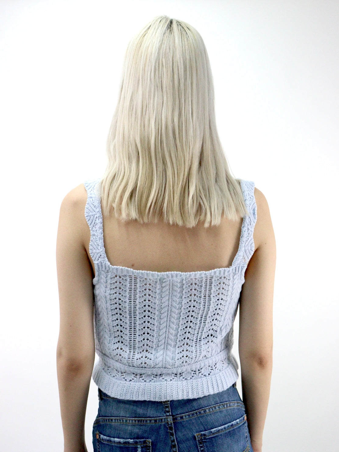 Blusa tejida con cordón ajustador de color azul