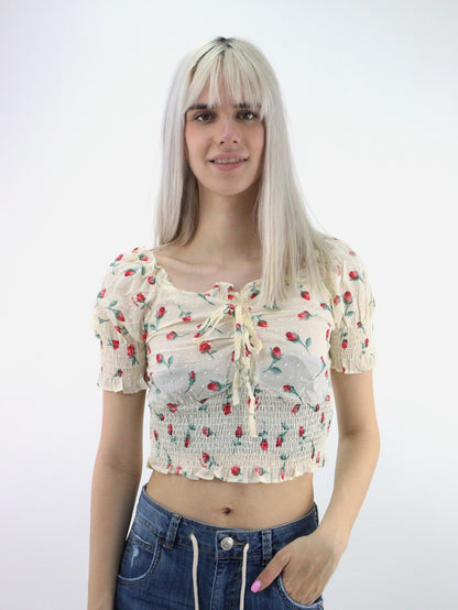 Blusa corta con estampado floral de manga farol con nudo delantero