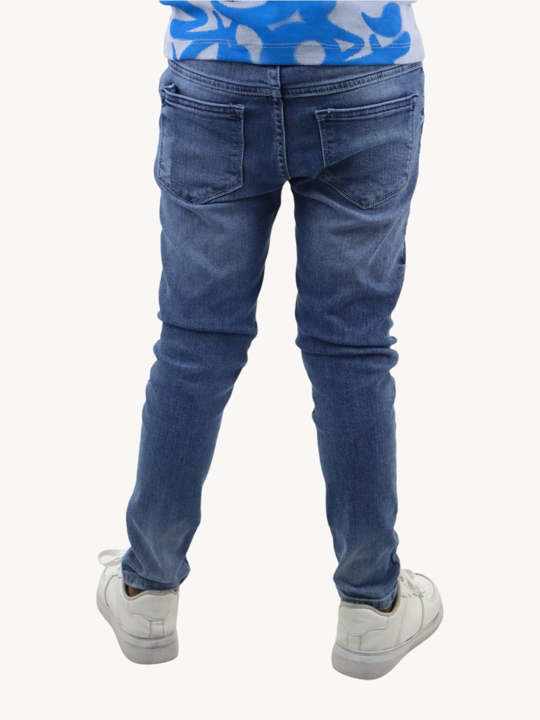 Jeans skinny de color azul con destrucción