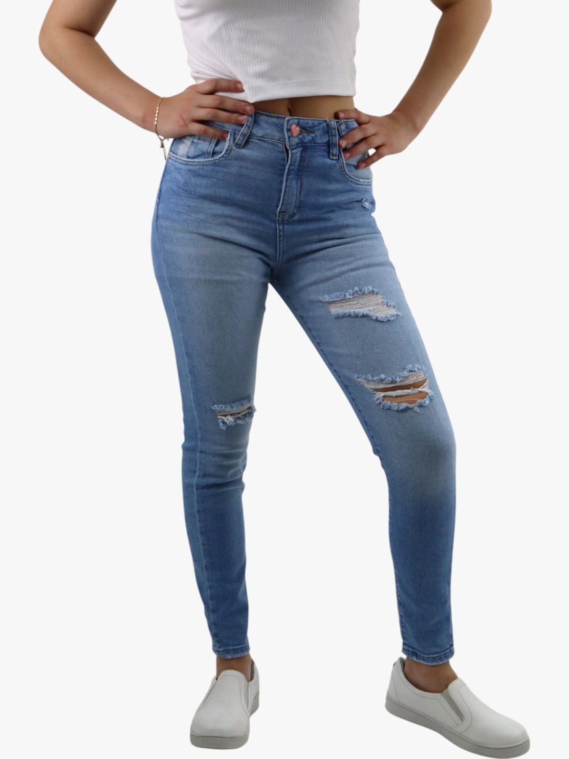 Jeans skinny azul claro con destrucción