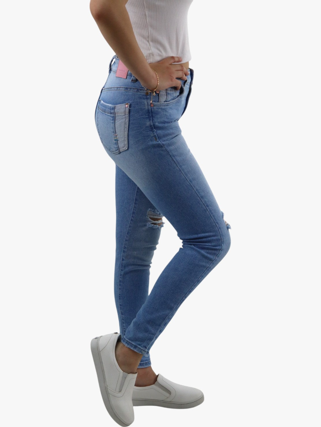 Jeans skinny azul claro con destrucción