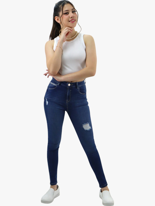 Jeans skinny tiro alto color azul oscuro con destrucción