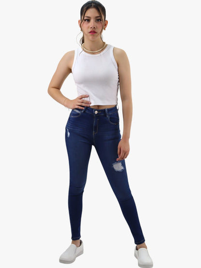 Jeans skinny tiro alto color azul oscuro con destrucción