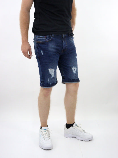 Short denim de color azul oscuro con destrucción