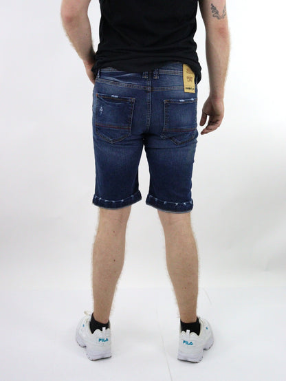 Short denim de color azul oscuro con destrucción