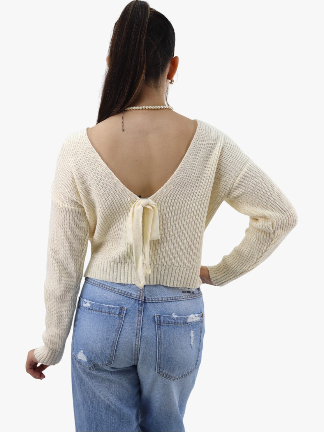 Suéter tejido frente cuello V con espalda descubierta