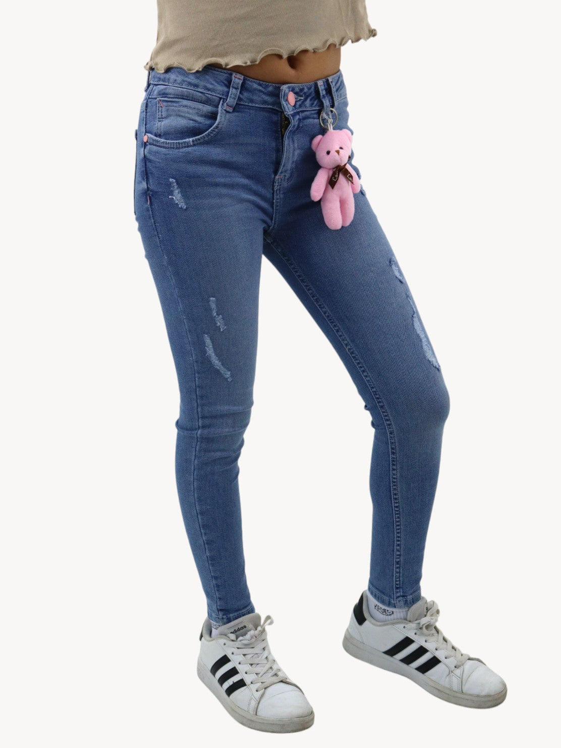 Jeans skinny con colgante decorativo