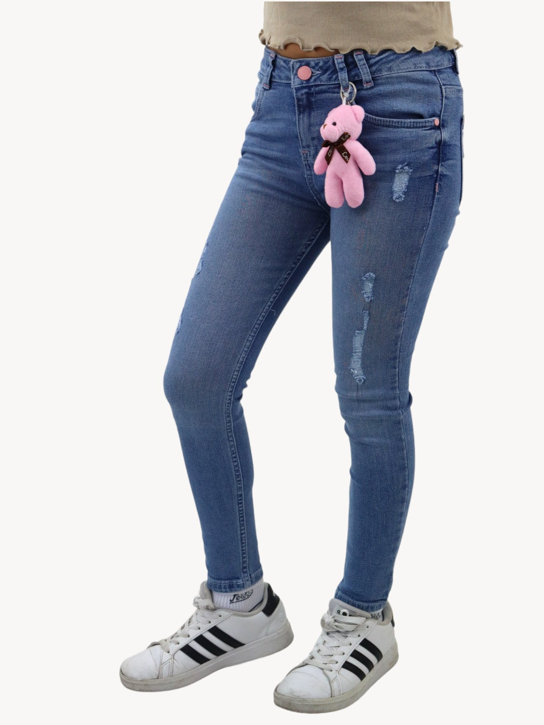 Jeans skinny con colgante decorativo