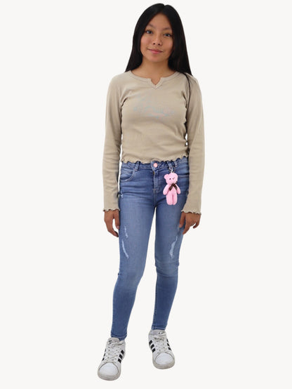 Jeans skinny con colgante decorativo