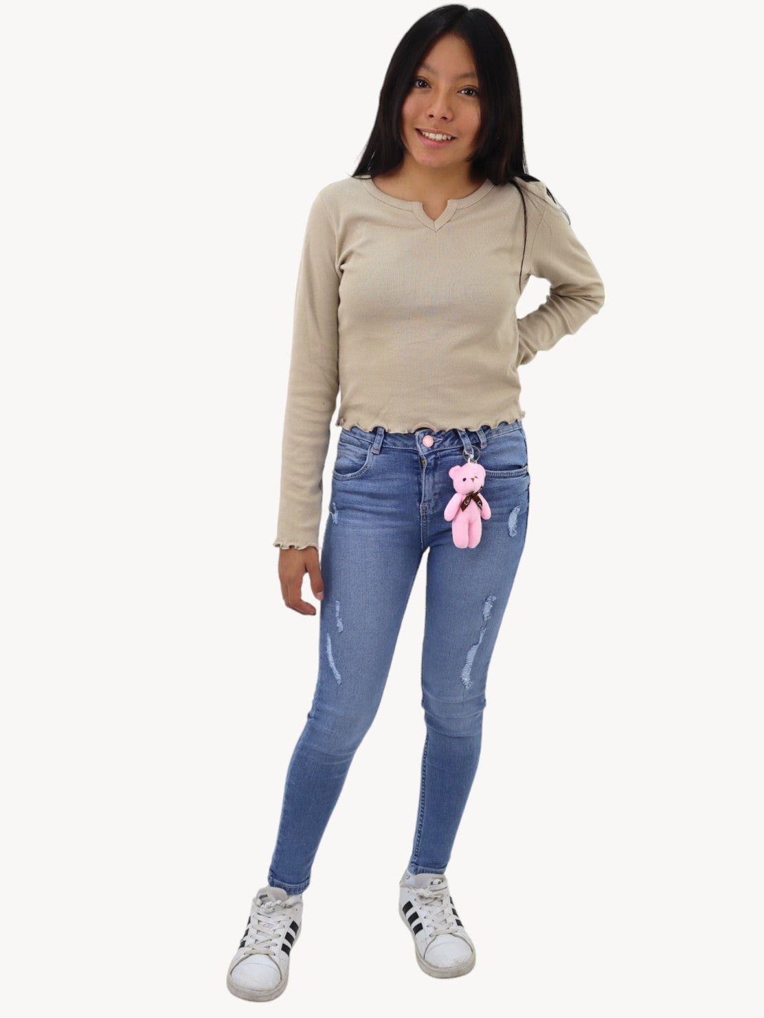 Jeans skinny con colgante decorativo