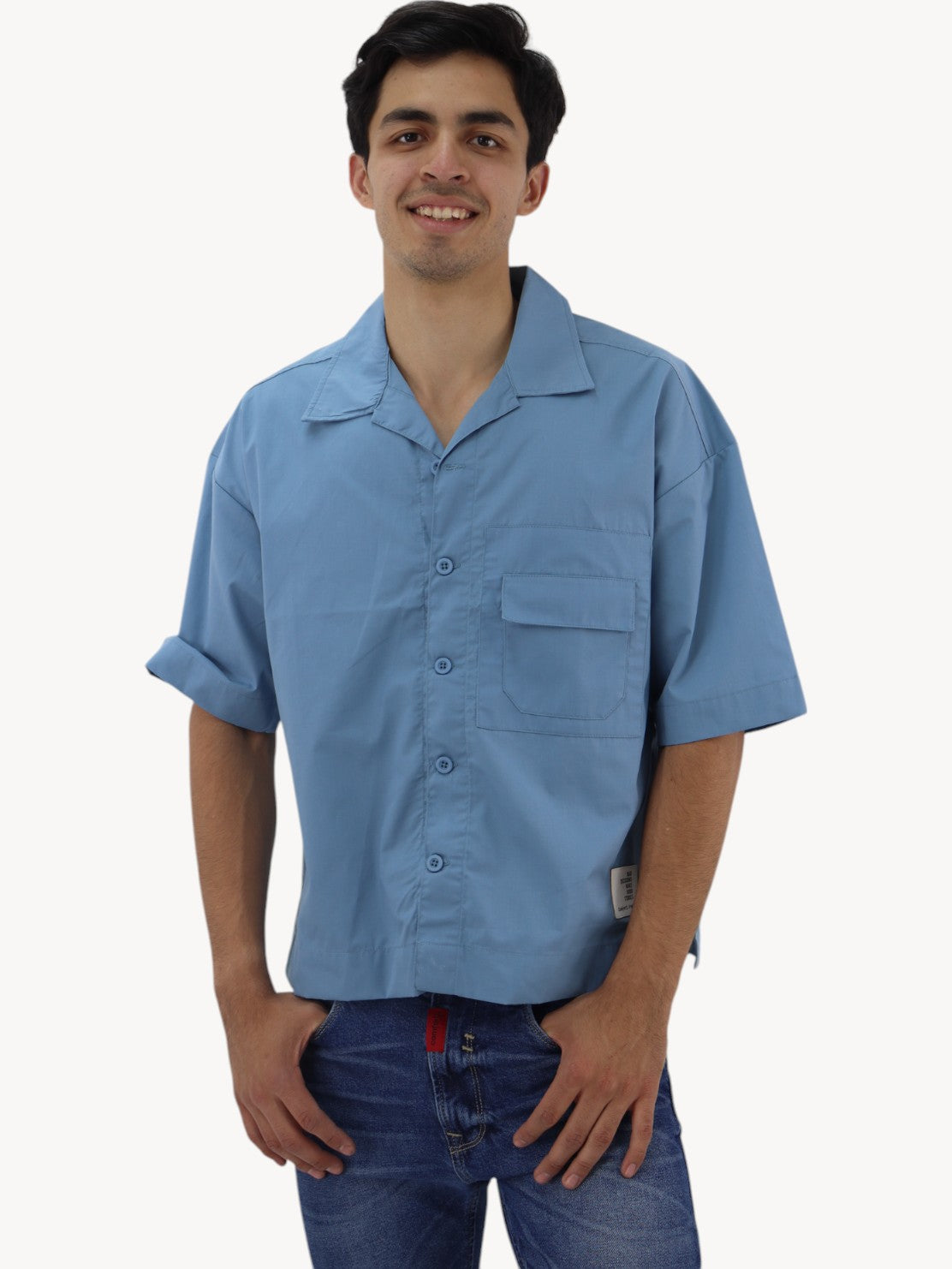 Camisa oversize con bolsillo de cartera