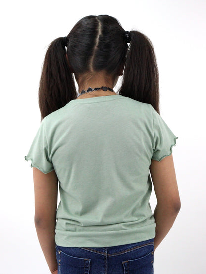 Playera manga corta de color verde con diseño de unicornio