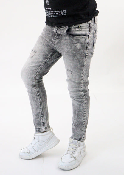 Jeans skinny de color gris con snow wash