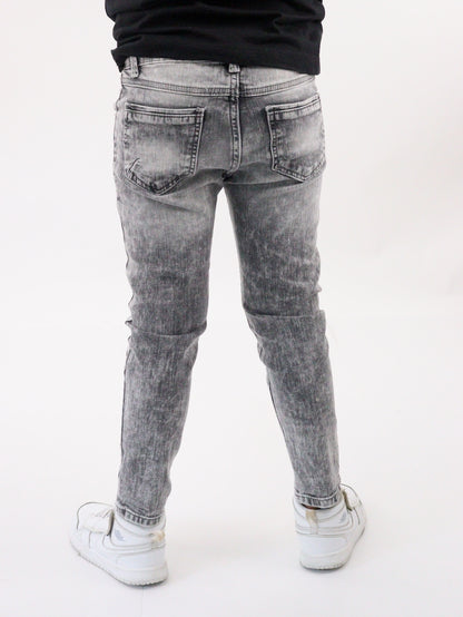 Jeans skinny de color gris con snow wash