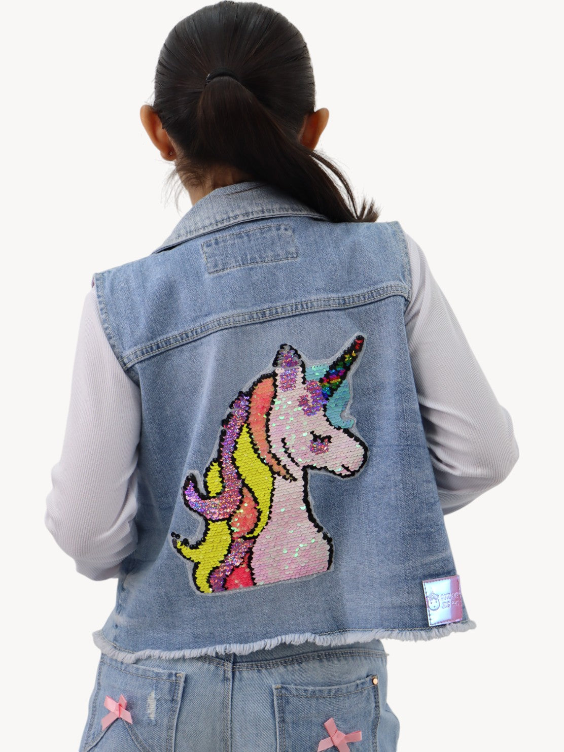 Chaleco denim con lentejuela reversible de unicornio
