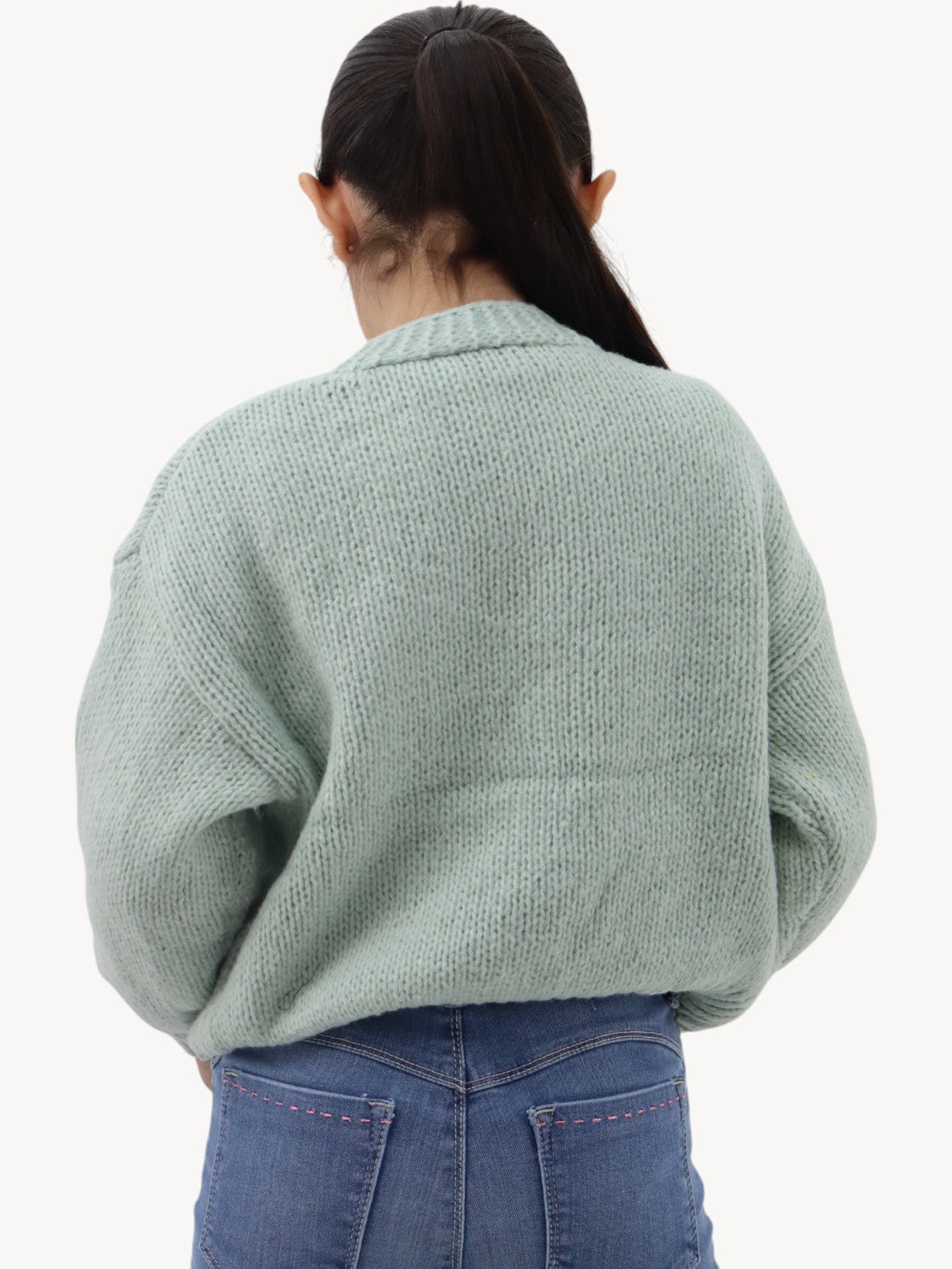 Suéter tejido verde menta con flores
