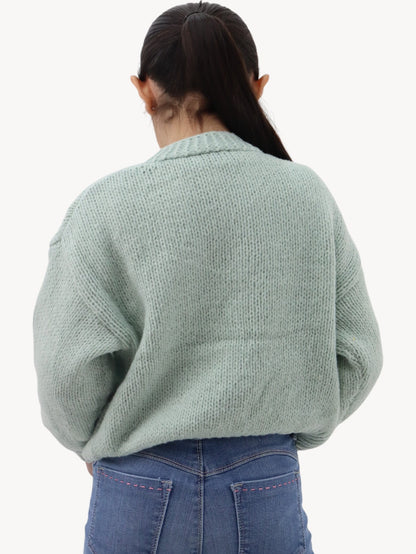 Suéter tejido verde menta con flores