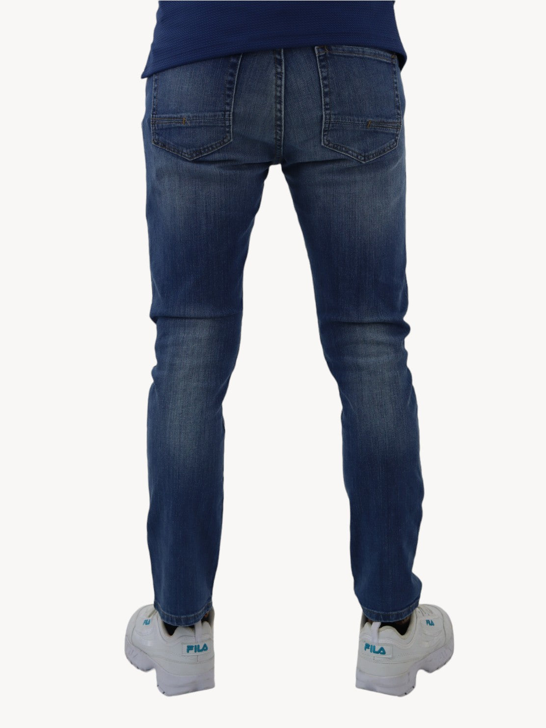 Jeans slim/skinny de color azul deslavado