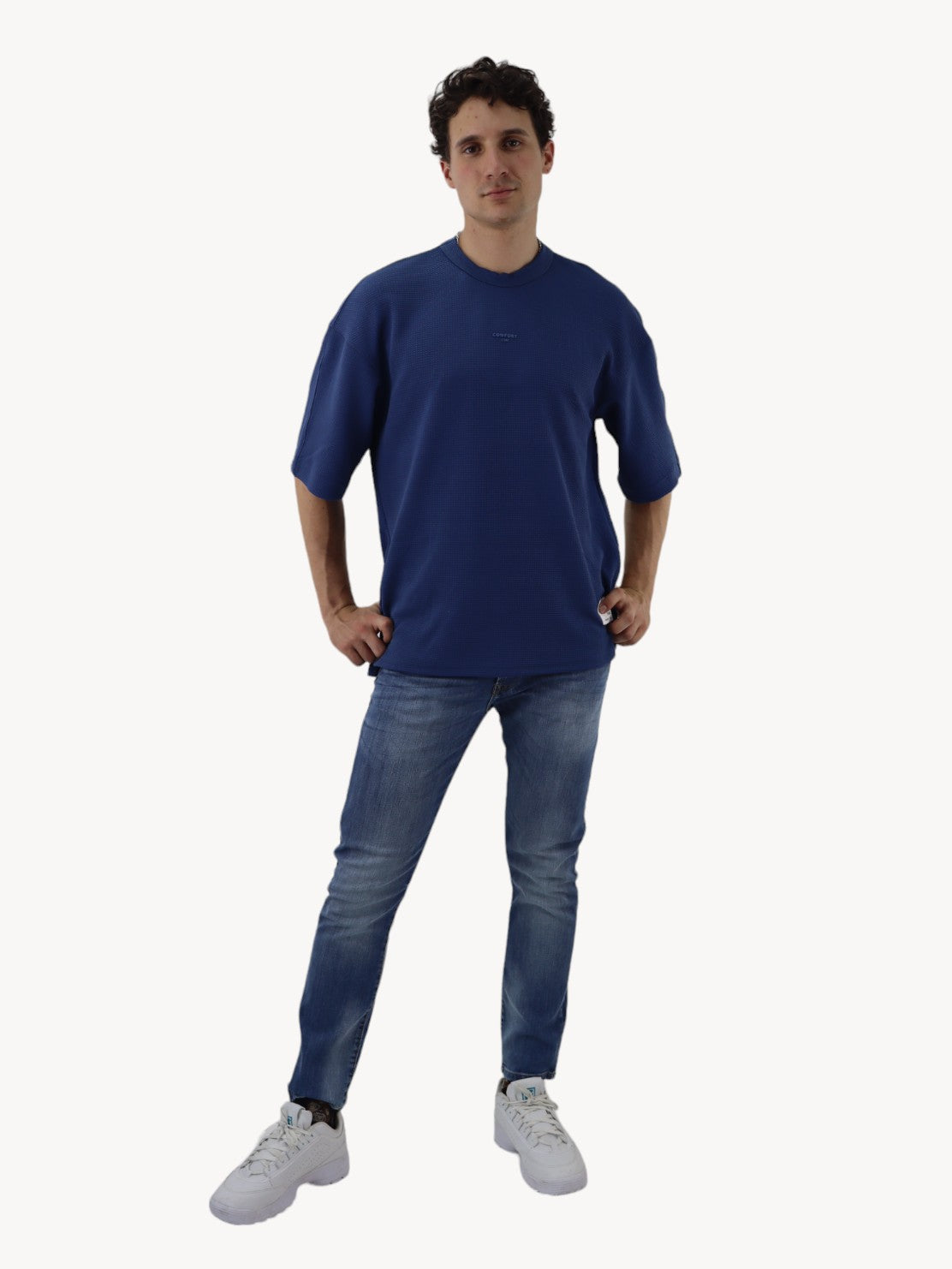 Jeans slim/skinny de color azul deslavado