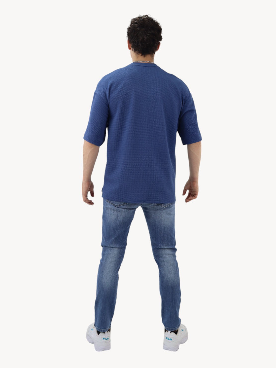 Jeans slim/skinny de color azul deslavado
