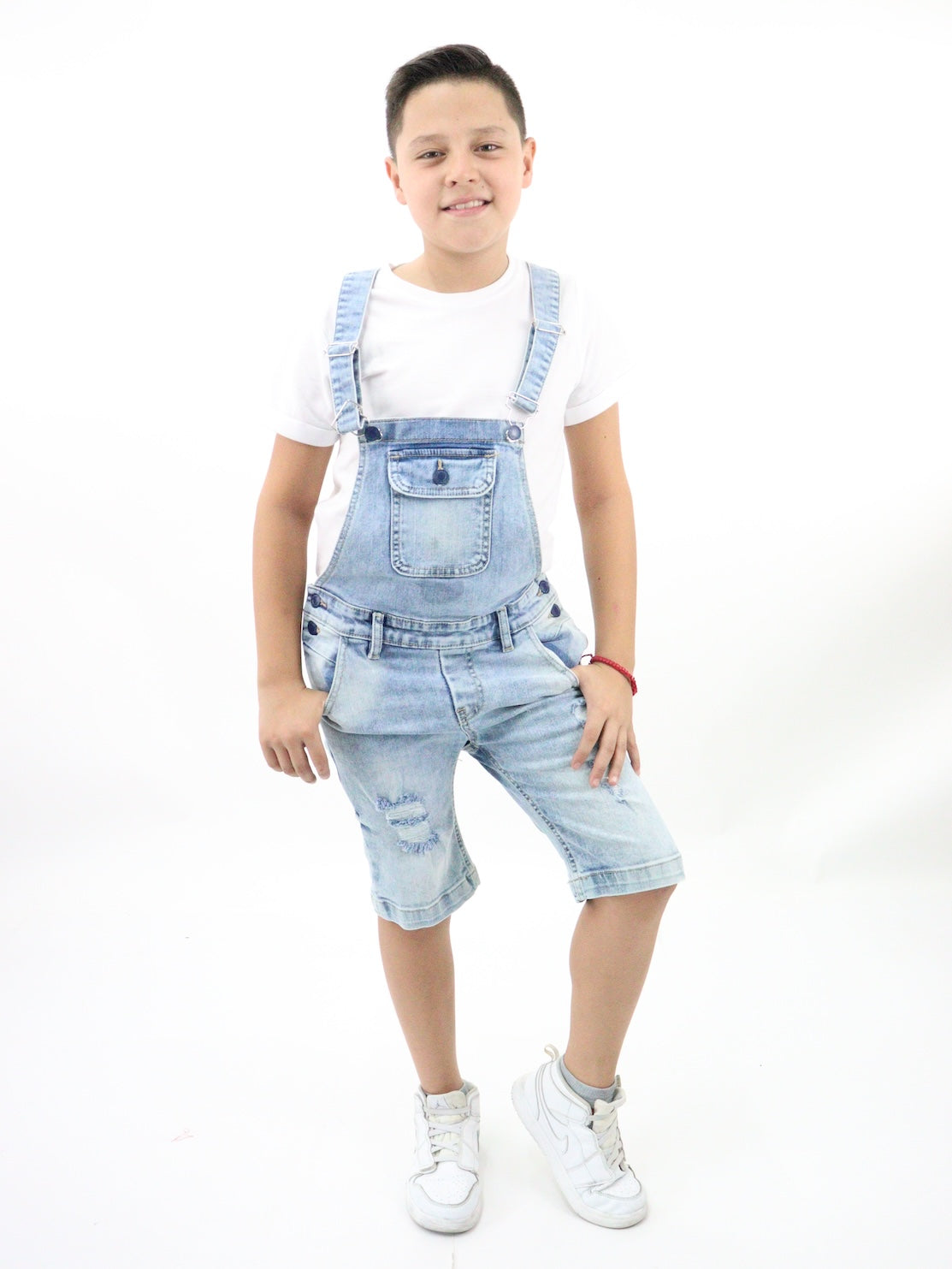 Peto/short de color azul claro con destrucción
