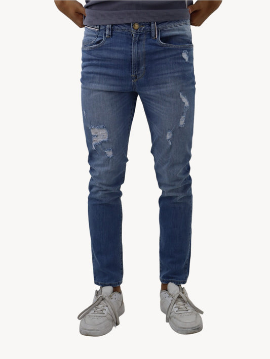 Jeans skinny azul claro con destrucción