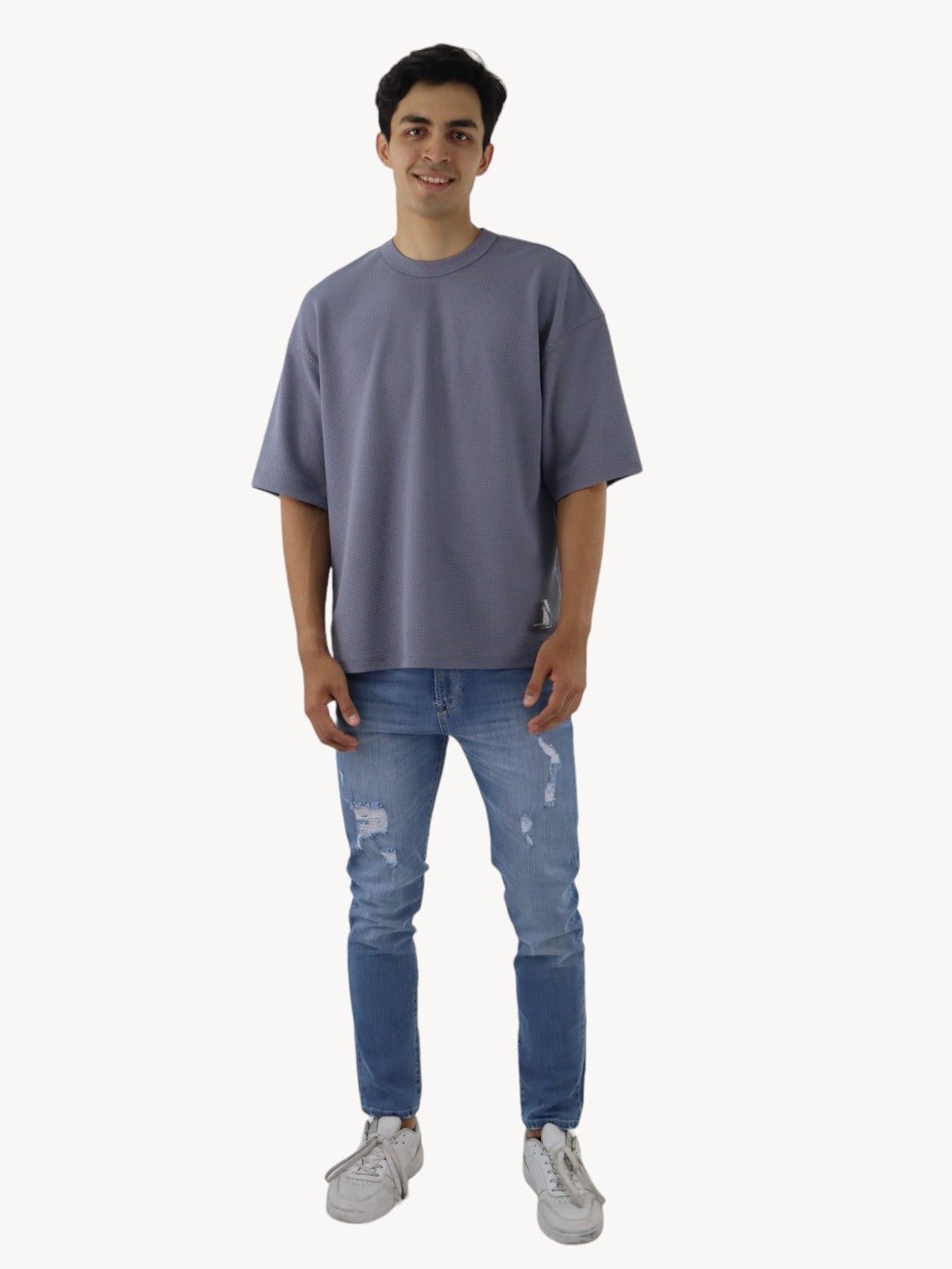 Jeans skinny azul claro con destrucción