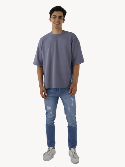 Jeans skinny azul claro con destrucción