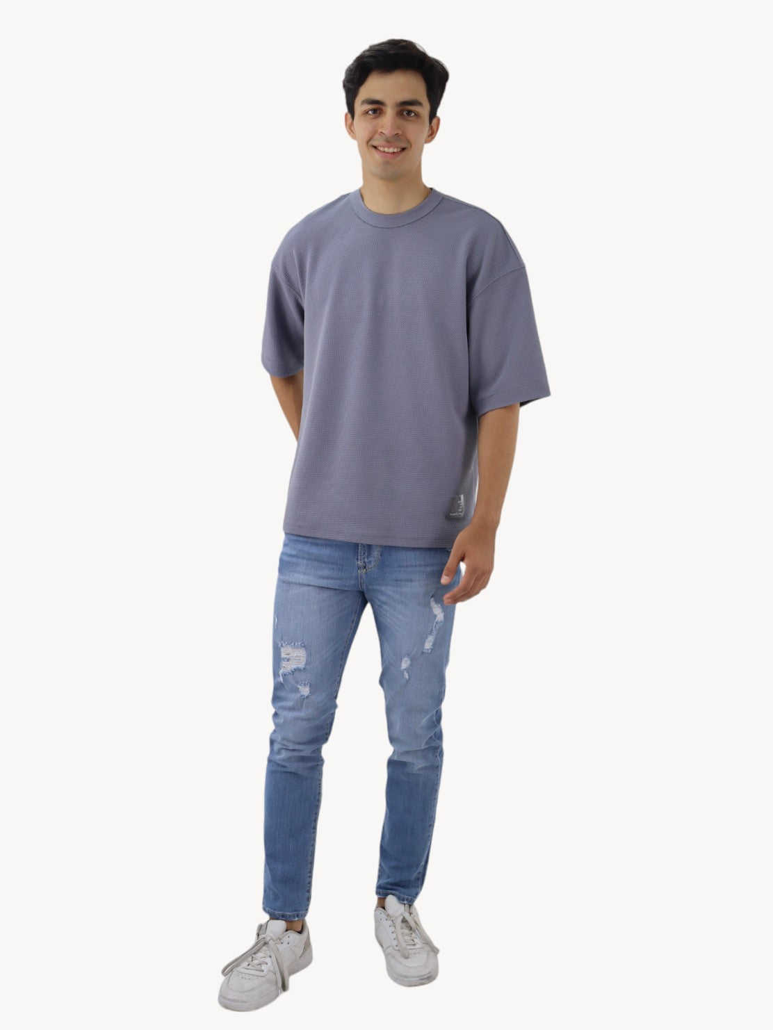 Jeans skinny azul claro con destrucción