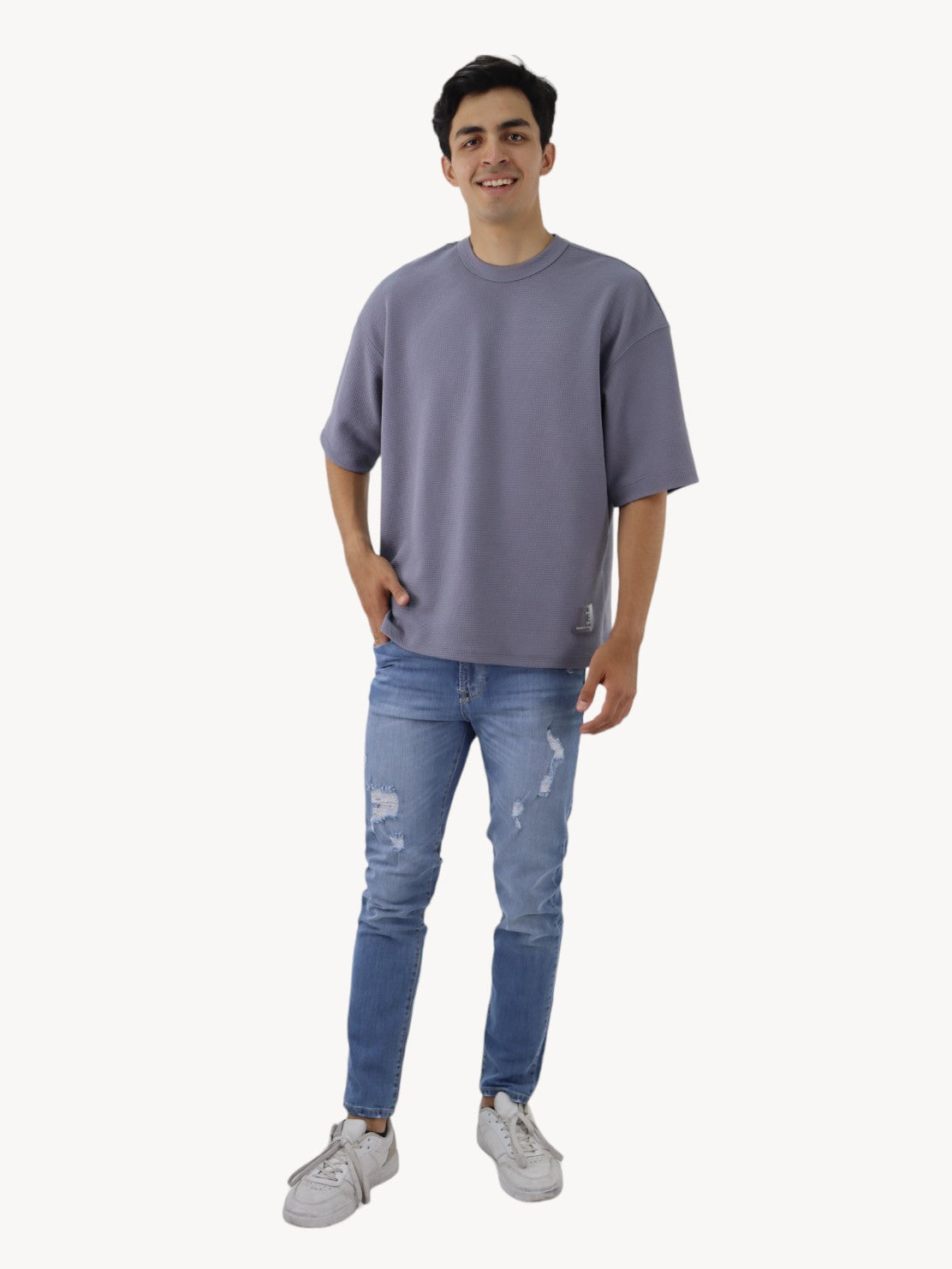 Jeans skinny azul claro con destrucción